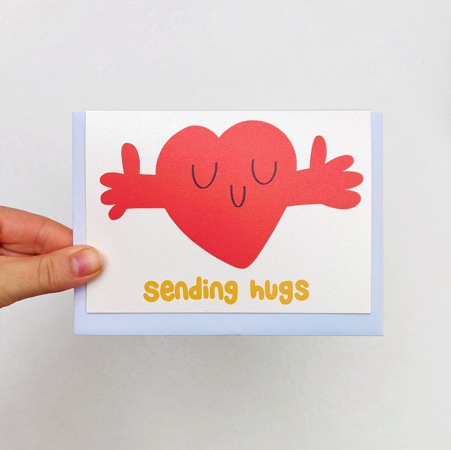 Sending Hugs Happy Heart Greetings Card