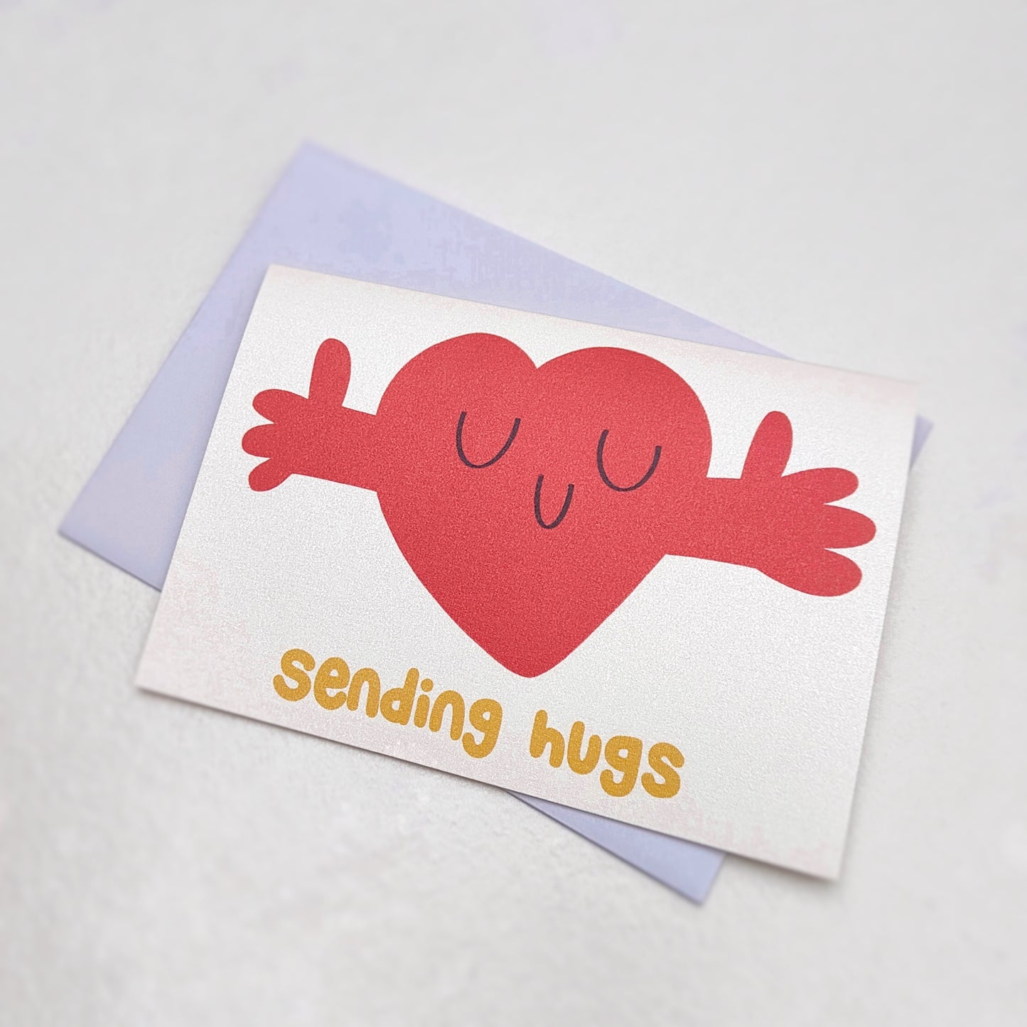 Sending Hugs Happy Heart Greetings Card